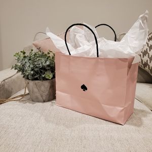 Authentic Kate Spade shopping bag with tissue